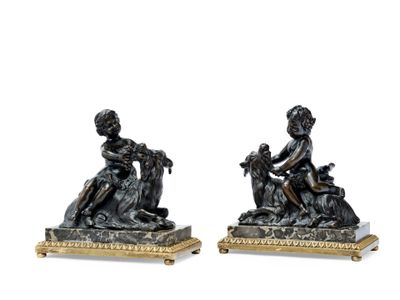 pair of antique bronze figurines of a boy and a dog