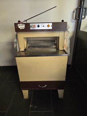a machine that is sitting in the corner of a room