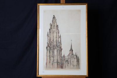 une image représentant un dessin d'une église posé sur un chevalet
