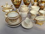 many different types of tea and coffee cups and saucers