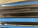 an image of a conveyor belt in a factory with a conveyor belt in the middle of the conveyor belt