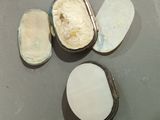 three tins of ice cream sitting on a table