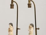 pair of antique chinese figurines of a boy and a girl