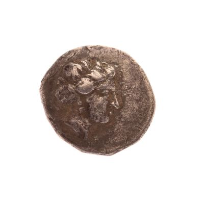 une image représentant une pièce de monnaie sur laquelle figure un visage