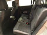 the back seat of a car with a seat belt in it