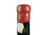 a bottle of wine that is sitting on a table
