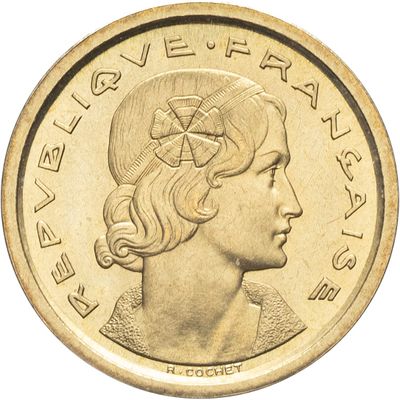 une image montrant un gros plan d'une pièce de monnaie à l'effigie d'une femme