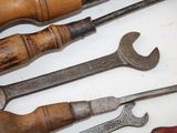 a lot of tools that are sitting on a table