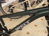 a close up of a bike parked in a room
