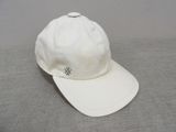 a white hat that has a monogram on it