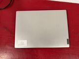 an apple macbook pro laptop is sitting on a red surface
