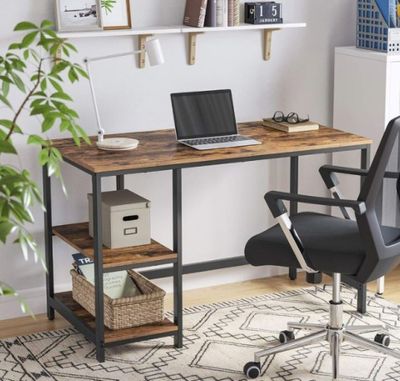 an image of a desk with a laptop on it