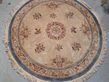 a round rug on the floor in a room