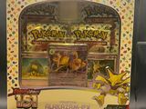 a close up of a display case with a pokemon figure in it