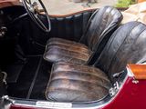 a close up of a leather seat in a vintage car