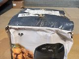 a box of fried chicken sitting on a table