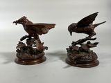 pair of bronze eagle figurines on wooden bases
