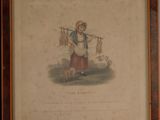 painting of a woman with a dog and a cat in a frame