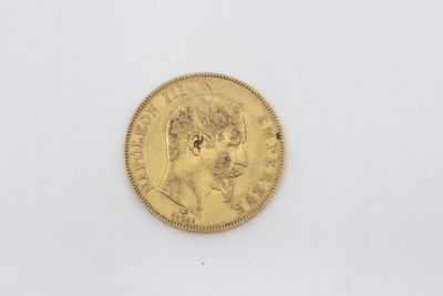 a gold coin with the head of a man on it