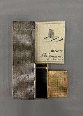 a close up of a cigarette case with a cigarette in it