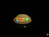 an image of a glowing object in the dark