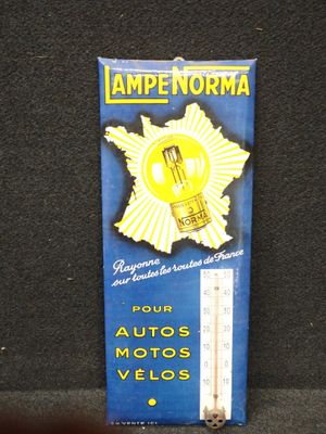 une pancarte sur laquelle est écrit « lamp norma »