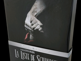 a black box with a picture of a person holding a knife