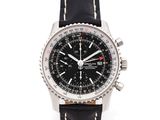 the watch is black and silver with a black leather strap