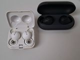 an image of a pair of earphones sitting on top of a table