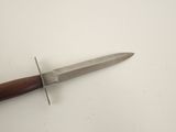 a knife that is laying on top of a table