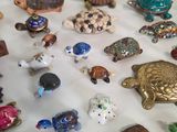 many different kinds of figurines on the table