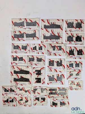 a picture of a bunch of postcards on the wall