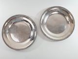 pair of silver plate with beaded rims on each side