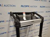 an image of a black and silver table with a price tag on it