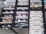 a lot of glasses that are sitting in a drawer