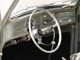 a steering wheel and dashboard of an old car