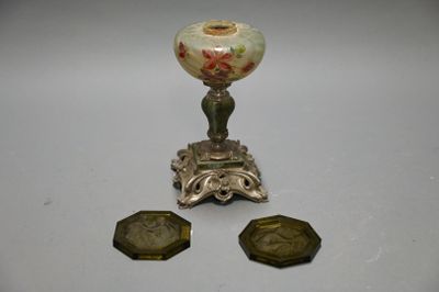 three pieces of silver and a vase on a table