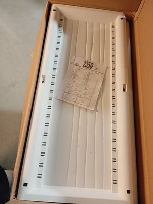 une boîte contenant un Venter blanc