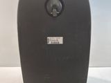 an image of a black suitcase with wheels on a white surface