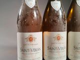 three bottles of wine sitting next to each other on a table