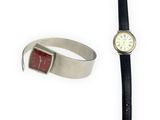 an image of a wrist watch and a bracelet on a white surface