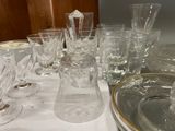 a table with a lot of glasses and plates on it