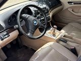 a view of the interior of a car from the driver ' s seat