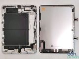 an image of a close up of a cell phone with a broken screen