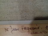 a close up of a piece of wood with writing on it