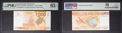 three different types of currency on display in a store window