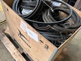 a box full of tires sitting on top of a wooden pallet