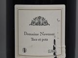 a label on a bottle of wine that says domaine newman