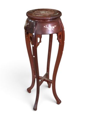 an image of a wooden table with a marble top