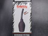 an image of a box of bondage pens on a black surface